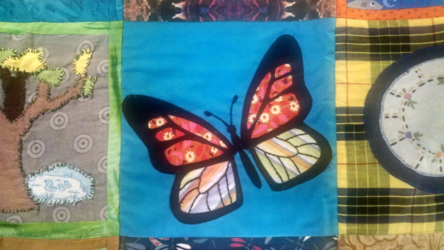 Handmade community quilt with key native animals? Check. I did a monarch butterfly (Danaus plexippus).